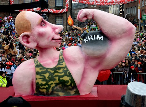 Karikatur: Putin und die Krim als Bombe
