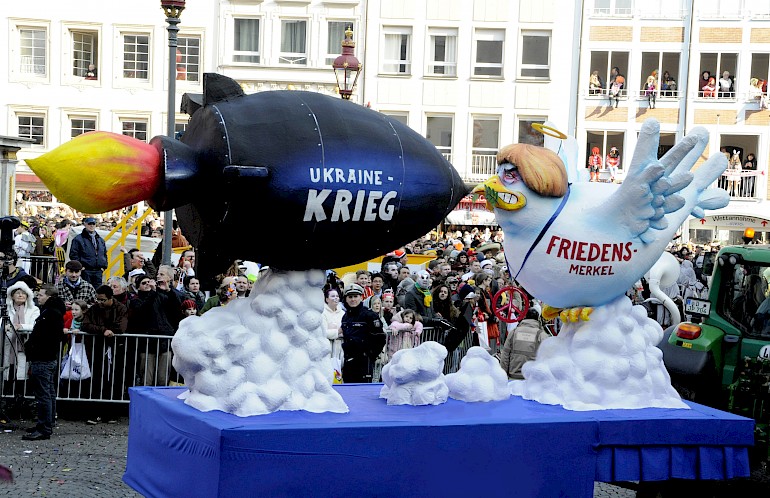 Karikatur: Ukraine Krieg und Friedens-Merkel